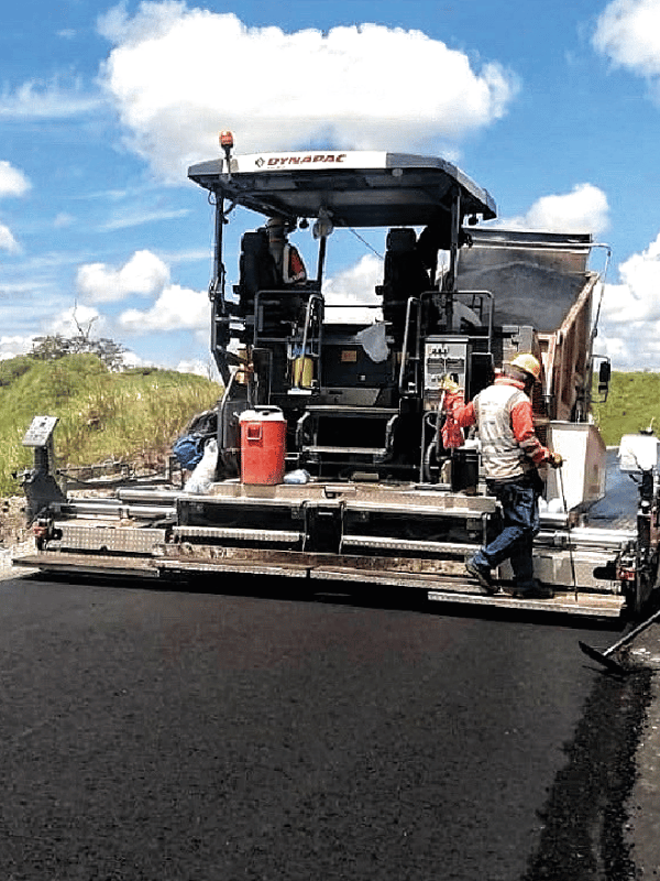 Paver laying asphalt mix on a road project
